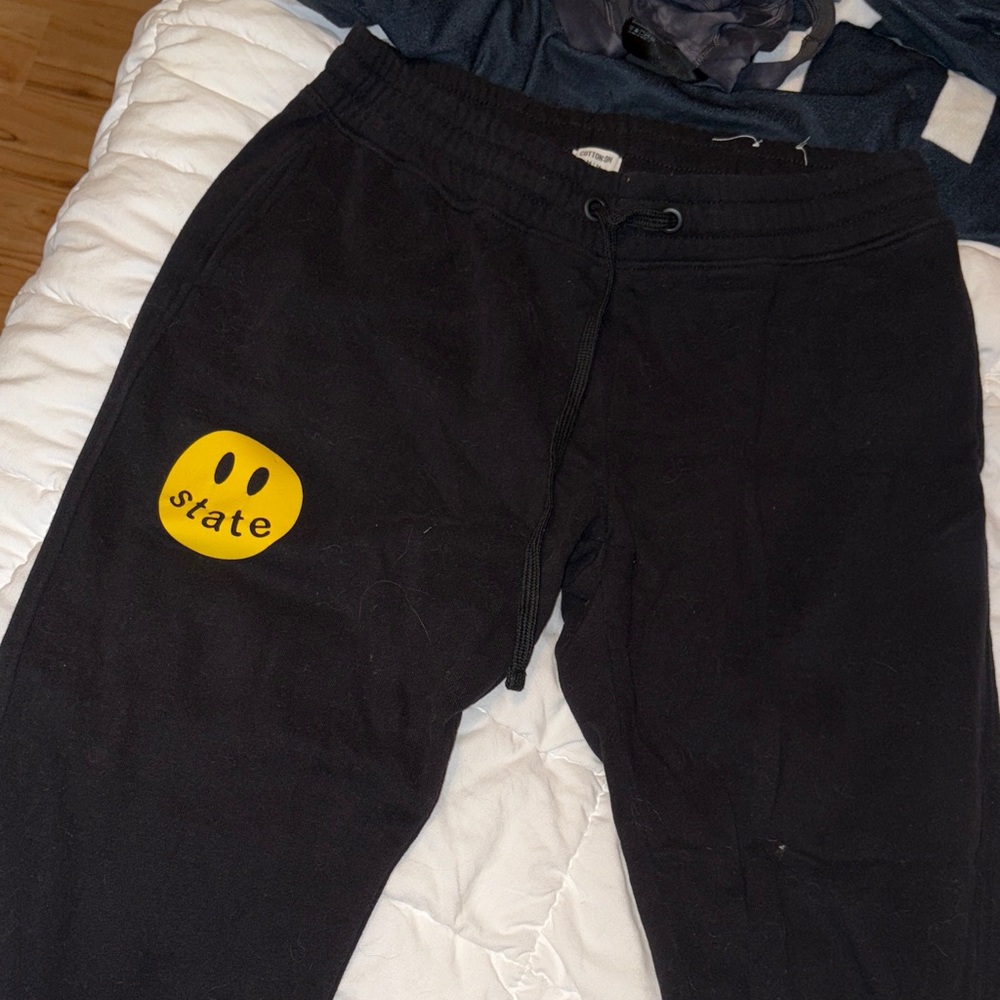 Penn State Women's Black Joggers with Yellow Smiley Patch